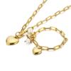 Los fabricantes suministran collares de corazón de melocotón con nicho de acero inoxidable europeos y americanos al por mayor Taobao otbuckle conjunto de cadena de clavícula de amor para mujeres