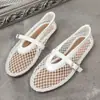 Sandalias de Talla Grande para Mujer de Comercio Electrónico Transfronterizo 2026 Primavera Verano Nuevas Punta Redonda Malla Hueca Estilo Europeo Americano Sandalias Planas