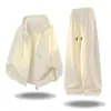 Conjunto esportivo casual texturizado para homens e mulheres, nova coleção primavera/outono 2026, apresentando um cardigã, moletom e calça de moletom, um conjunto de duas peças para adolescentes