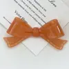 Fábrica de origen, falda de color liso hueca, dobladillo, accesorios de lazo de acetato, productos semiacabados hechos a mano para bricolaje, en stock para personalización