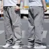 Pantalones casuales de talla grande para hombre de Amazon transfronterizos, nuevo estilo primavera/verano, extragrandes para personas altas y corpulentas, pantalones largos rectos holgados elásticos