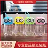 Botella de embalaje de plástico de animal de dibujos animados de fábrica lata de caramelo PET grado alimenticio ojo grande doctor Xiaohuang merienda arcilla de colores