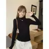 Suéter azul de cuello medio alto para mujer, nuevo estilo de invierno 2026, camiseta básica de punto holgado con volantes