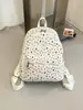 Mochila com estampa de estrelas, grande capacidade, simples e versátil, adequada para estudantes, estilo coreano, com estampas de letras e um visual preppy de faculdade.