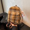 Mochila da moda feminina casual de lona portátil pequena mochila escolar de estudante design de nicho mochila de alta qualidade