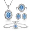 Transmisión en Vivo Venta Caliente Piedra Preciosa de Color Corte Flor de Hielo Huevo de Paloma Girasol Set Anillo Pendientes Collar de Diamante de Alto Carbono de Moda de Lujo