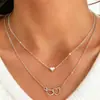 Collar Europeo y Americano de Venta Caliente Transfronterizo, Moderno y Versátil, Exquisito Collar Fino de Doble Corazón Corazón de Melocotón Juego de 2 Piezas de Joyería