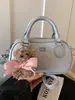 Diseño de Nicho Transfronterizo para Mujer Primavera 2026 Nuevo Estilo Moda de Alta Calidad Simple Versátil Bolso Cruzado de Hombro Tipo Almohada