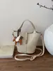 Bolsa de Mão de Luxo Transfronteiriça para Mulheres 2026 Novo Estilo Bolsa de Ombro Único Transversal Casual Retrô Bolsa Cesto Balde