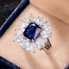 Anillo de circonita azul brillante de alta gama con incrustaciones de diamantes y temperamento femenino de Cao Shi TikTok Live