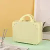 Mini maleta de 13 pulgadas, estuche de maquillaje, caja de almacenamiento de oso de dibujos animados, maleta de viaje pequeña y ligera