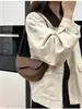 Bolso Saco Versátil de Alta Gama para Mujer Primavera/Verano 2026 Nuevo Bolso Cruzado de Moda para el Trabajo con un Toque Vintage y un Toque de Alta Gama
