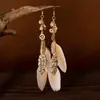 Brincos Boêmios de Folha e Pena, Estilo Étnico Retrô, Brincos Elegantes de Alta Qualidade, Joia Longa com Gancho de Corrente para Mulheres