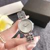 Relojes de pulsera de acero de temperamento simple ultrafinos suministro al por mayor de comercio exterior transfronterizo de relojes de cuarzo impermeables con disco de personalidad para mujer