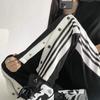 Pantalones de peto Deportes para hombre y mujer primavera y otoño pantalones gruesos entrenamiento de baloncesto botón lateral abierto sueltos pierna ancha sueltos rectos