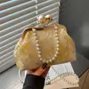 Bolso bordado de estilo chino transfronterizo 2026 para mujer, nuevo bolso bandolera con cadena de perlas, bolso de mano de nicho súper popular, bolso de concha