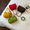 Bolso de diseño nicho coreano principios de otoño 2026 bolso cubo color sólido vintage bolso de mano para el día a día bolso bandolera para el trabajo