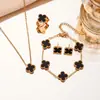 Set de Collar de Acero de Titanio Cuatro Hojas Doble Cara No Descolorante para Mujer, Moderno, Elegante, Lujo Ligero, Sensación de Alta Gama, Pulsera de Nicho al por Mayor
