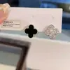 Pendientes de Aleación de Cobre con Circonita Sintética Clásico Doble Cara Moda Simple Francés Entrada Lujo Flor de Cuatro Hojas Hebilla de Oreja Nuevo para Mujeres