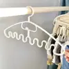 Agite o som da mesma rede de ondas vermelhas cabide multifuncional roupas penduradas lenço de seda sling sem costura sem costura cabide de plástico antiderrapante atacado