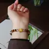 Pulsera de Piedra Ojo de Tigre Natural Pulsera de Cristal K9 Lujo Ligero de Gama Alta Joyería de Perlas Retro Otoño e Invierno Venta al por Mayor