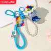 Mini Ramo Nuevo Día del Maestro con Cadena de Perlas y Llavero de Doble Cuerda, Crochet Hecho a Mano, Regalo para Maestros en el Día del Maestro