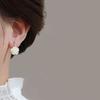 Nuevos aretes únicos de este año aretes de flor blanca francesa estilo Hepburn aretes de camelia de té de alta gama retro