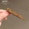 Elegante y estiloso clip de una palabra con pedrería color champán, nuevo estilo de celebridad de internet para mechones de fleco, clip de pico de pato exquisito