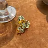 Pendientes de Flor Metálica Plegada Pendientes Europeos y Americanos Exagerados Elegantes Moda de Nicho Pendientes de Gama Alta Anillos para Mujer Collar