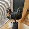 Bolso cruzado de un solo hombro estilo vintage chic 2026 transfronterizo, bolso de nicho moderno para mujer, bolso de axila casual estilo coreano para el día a día