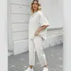 Conjunto de Tricô Cruzado de Manga Longa com Gola Alta Meia-Alta e Manga Morcego, Conjunto de Duas Peças com Calça de Perna Larga Solta e Fluida, Manga Curta para o Início do Outono