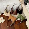 Nueva colección de bolsos de otoño e invierno: bolso de axila elegante, versátil y moderno, perfecto para el trabajo y los desplazamientos, bolso de hombro de gamuza para mujer