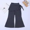 Pantalones de microcampana de tiburón para niños, cordón para niñas, imitación de dos piezas, versátiles de cintura alta, holgados, gruesos, pantalones deportivos y falda, al por mayor