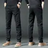 Hong Kong 2026 Outono Novas Calças Casuais Masculinas Soltas de Perna Reta High-End Business Primavera e Outono Moda Masculina Elásticas Longas