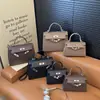 Nuevo bolso de mano vintage Kelly para mujer, bolso cruzado, bolso para ir al trabajo, bolso de hombro simple y elegante para mujer