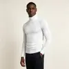Suéter de cuello alto para hombre 2026 transfronterizo otoño e invierno corte ajustado tejido capa base color liso elástico ropa interior en stock venta al por mayor