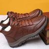 Una generación de zapatos de montañismo de cuero transpirable para hombre, zapatos casuales de suela suave, zapatos deportivos para exteriores de suela gruesa, zapatos transfronterizos de talla grande para hombre