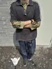 Top de Malha Respirável com Recortes de Verão Gola V Masculino Retro Americano Design Solto Casual Gola Manga Curta