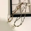 Collar Colgante de Flor con Cuentas de Piedra Ojo de Tigre Melard para Mujer 2026 Nuevo Diseño Nicho Colgante Largo Collar para Suéter