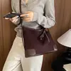 Bolso tote retro con estampado de leopardo para mujer, nueva colección otoño/invierno 2026, bolso de axila con retazos de gamuza, bolso de hombro color Maillard, bolso cruzado