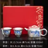 Juego de té de plata dorada, una tetera y dos tazas, juego de té kung fu de viaje portátil de servicio rápido, caja de regalo, adecuado para regalar a personas mayores durante el Festival del Medio Otoño y el Día Nacional