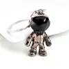 Una generación de llaveros de regalo para coche personalidad creativa astronauta cuerda de cuero para hombre llavero de cuero de simulación para coche