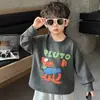 Camiseta interior de cuello redondo para niño, nueva colección primavera/otoño 2026, top de manga larga para niños, camiseta de dibujos animados para niños pequeños y bebés