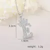 Accesorios de Collar con Letra de Zirconia Incrustada de Cobre Nuevo Transfronterizo Hip-Hop Doble Capa Corona Colgante de 26 Letras Inglesas