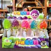 Paletas y Caramelos Duros en Varias Formas de Frutas para que los Niños Compartan Dulces y Den a sus Amigos Regalos Navideños. Puestos en la Puerta de la Escuela