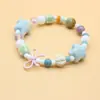 Venta al por mayor del fabricante Pulsera de Cerámica de Estilo Chino Nuevo de Nicho Pulsera Magnética de Perlas de Estrella de Mar Pulsera para Niños Joyería Retro de Estilo Nacional Venta al por mayor