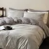 2026 Juego de Ropa de Cama de Alta Gama Clase A 100% Algodón Jacquard Estilo Homestay para Hotel Juego de Cuatro Piezas Funda de Edredón y Sábana Bajera Nantong Home Textile
