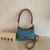Bolso de Mujer Retro de Nicho de Moda de Shuai Mi 2026 Verano Nuevo Bolso Cruzado para el Trabajo Bolso de Hombro Único Bolso de Cubo