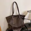 Bolsa Tote Versátil para Uso Diário Transfronteiriço para Mulheres 2026 Outono Nova Bolsa de Mão/Ombro de Alta Qualidade