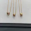 Collar de Cuentas Doradas Acolchado Pequeño de Alta Gama Estilo Coco Chanel para Mujer, Nuevo Colgante Artesanal CNC Cadena para Clavícula, Entrega Directa de Fábrica